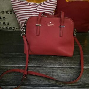 Kate Spade New York Cedar Street Maise satchel in red saffiano leather.